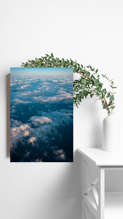 Above the Clouds: Majestic Aerial Mountain View Metal Poster